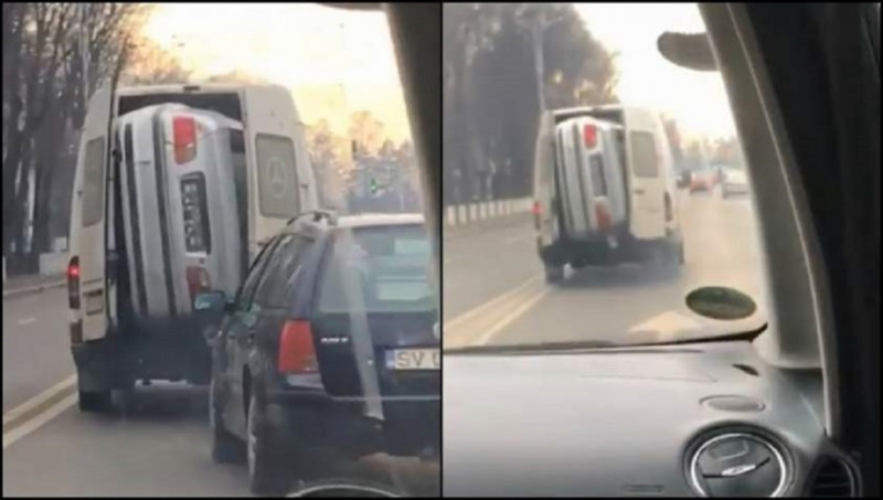 Kerel transporteert BMW in een... bestelwagen (video)