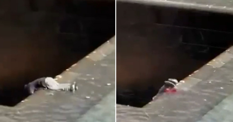 Verwarde man duikt met hoofd eerst in zwembad van 9/11 Memorial in New York (video)