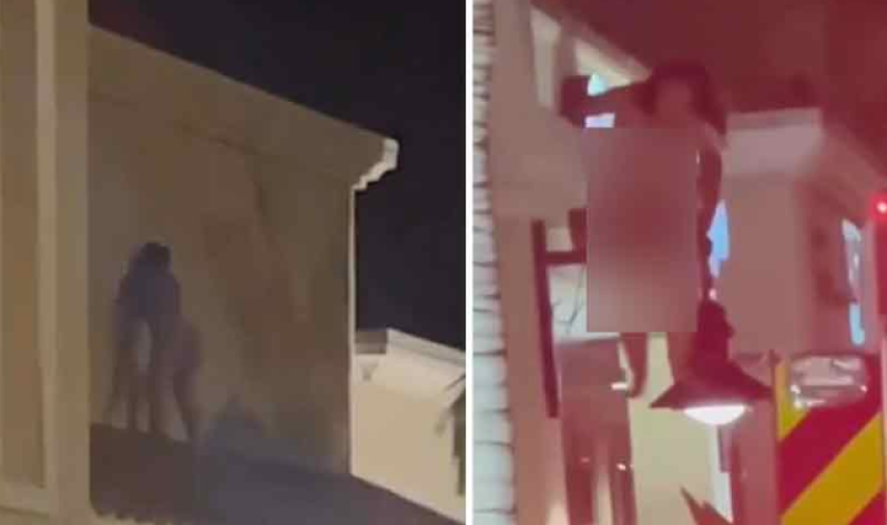 Naakte dronken juffrouw valt met haar klikken en klakken van het dak (video)